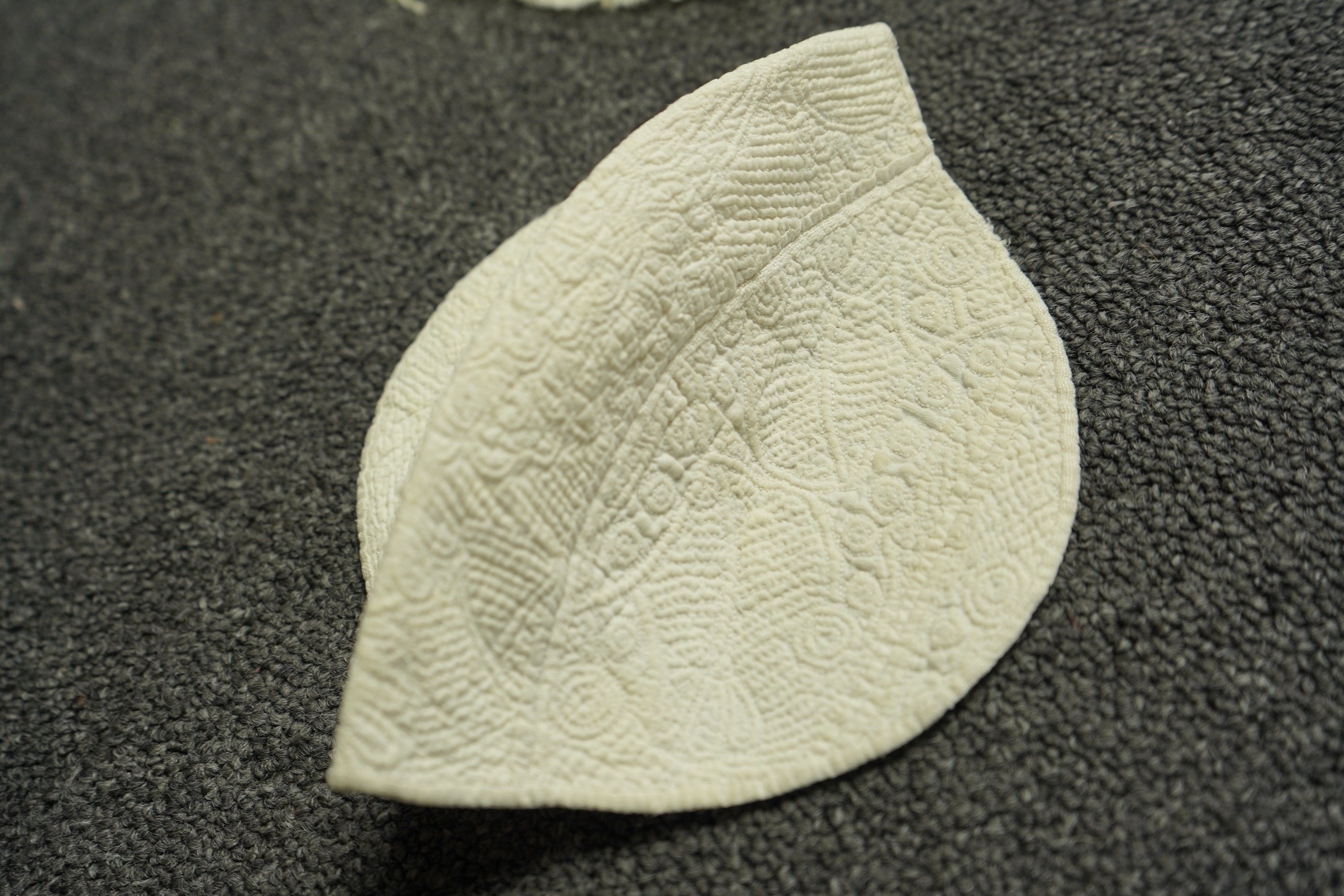 A collection of six baby’s bonnets from the mid 18th century to the late 19th century. An 18th century Hollie Point inserted baby bonnet, a quilted 18th century baby bonnet, two white work bonnets with needle lace crown